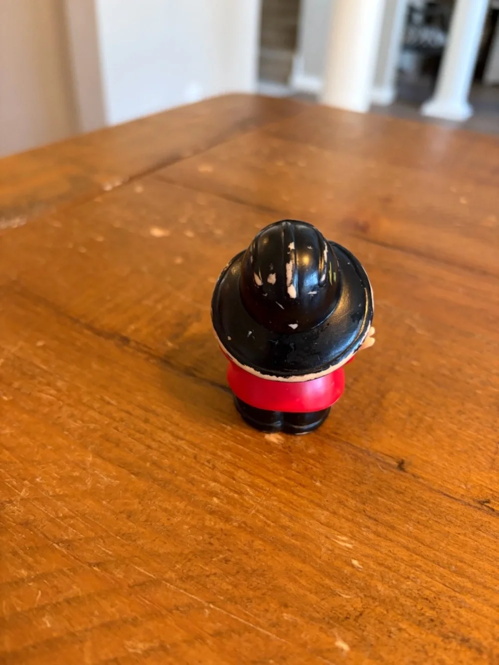 Fisher Price Little People firefighter as is. Has paint wear around hat